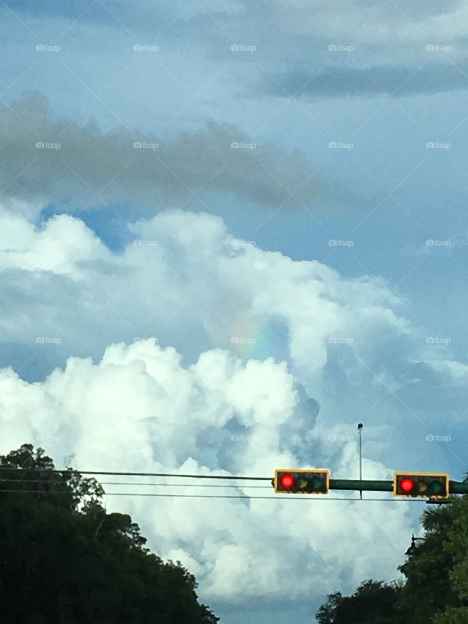 Clouds and a rainbow 
