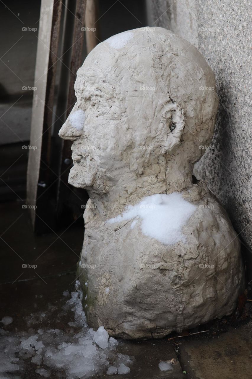 A statue under the snow