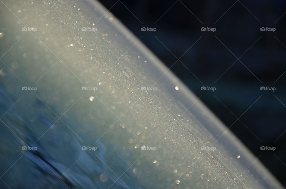 frozen windshield that shines through the sun