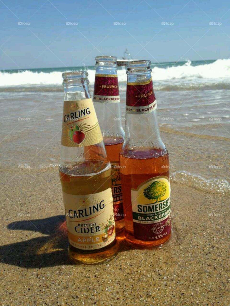 bottles on the beach. Black sea