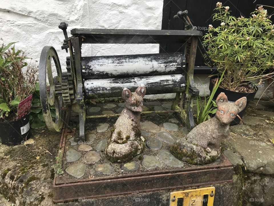 I am not to old to remember a mangle, but this one looks a little worse for wear, but it adds to its originality.