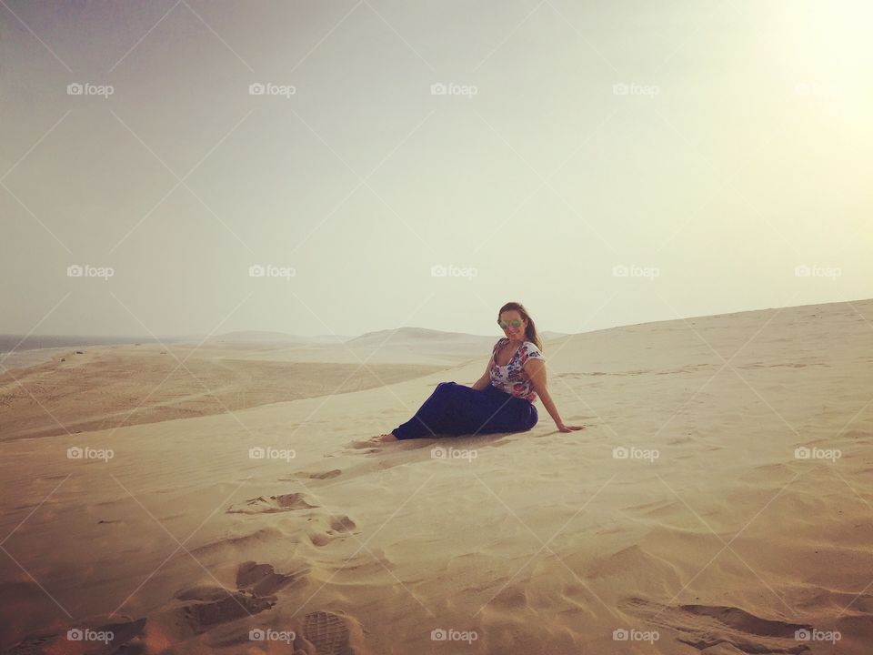 Young woman posing in desert