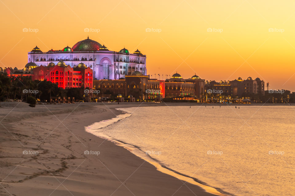 Enirates Palace at the sunset from the seaside
