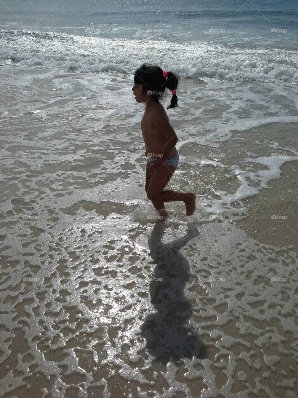 daughter in the beach. daughter in the beach