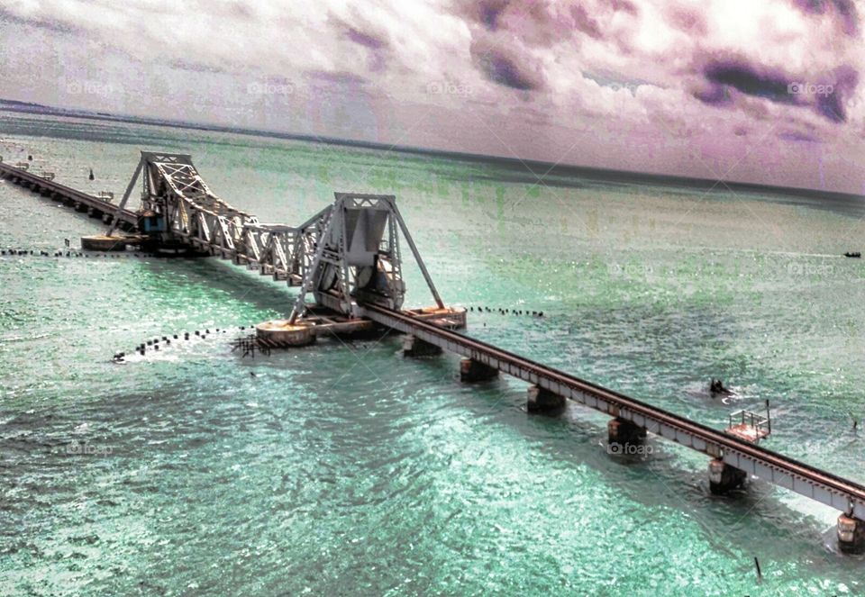 Pamban Bridge is a railway bridge which connects the town of Rameswaram on Pamban Island to mainland India. Opened on 24 February 1914 it is India's first sea bridge.