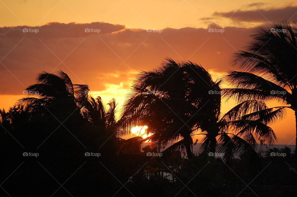 Sunset on Poipu Beach, Kauai, Hawaii. 
