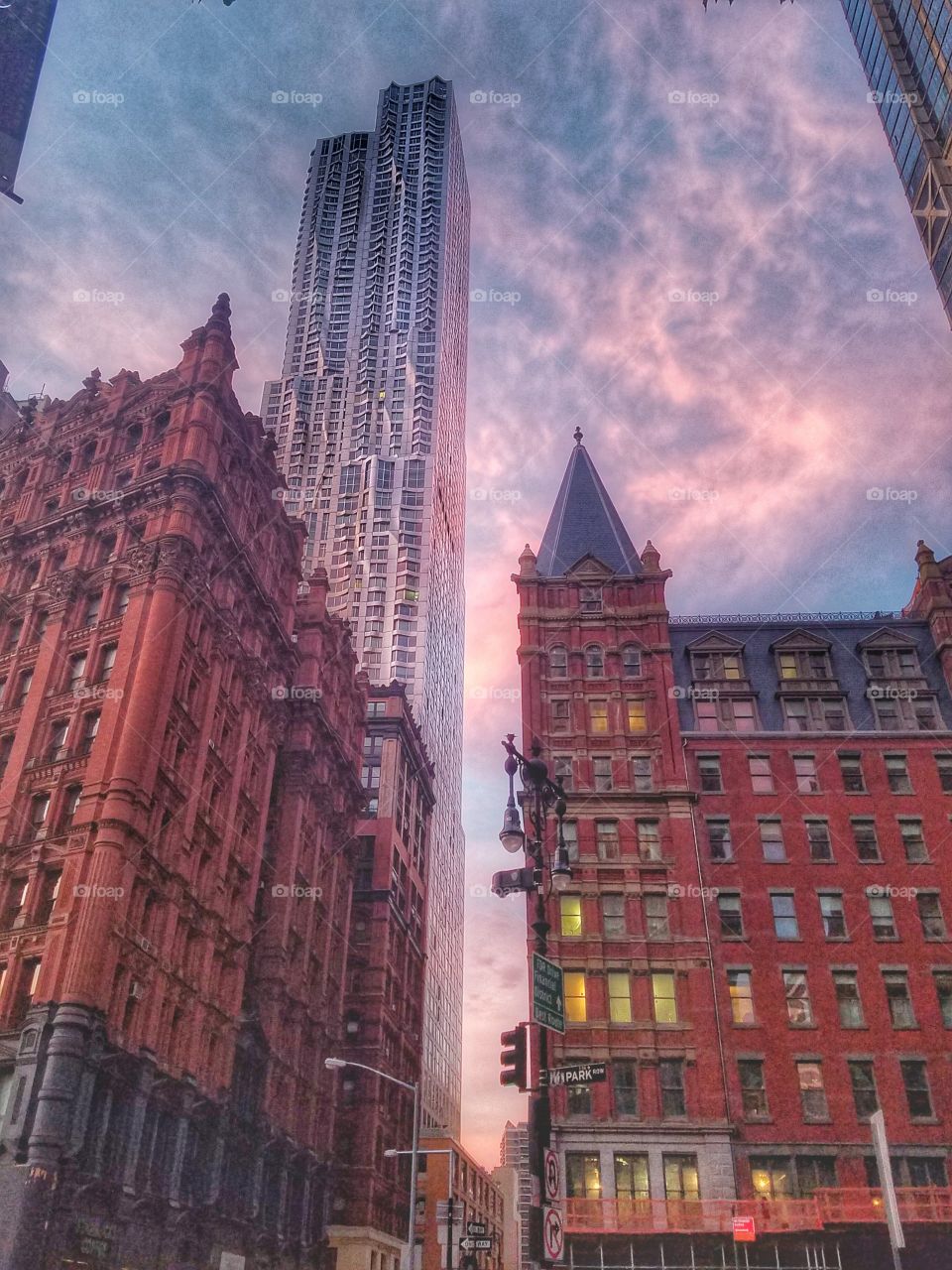 Low angle view of building against dramatic sky