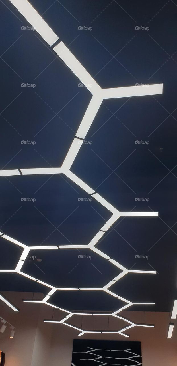 lighting design on the ceiling of one of the sales establishments of Los Aviadores shopping center