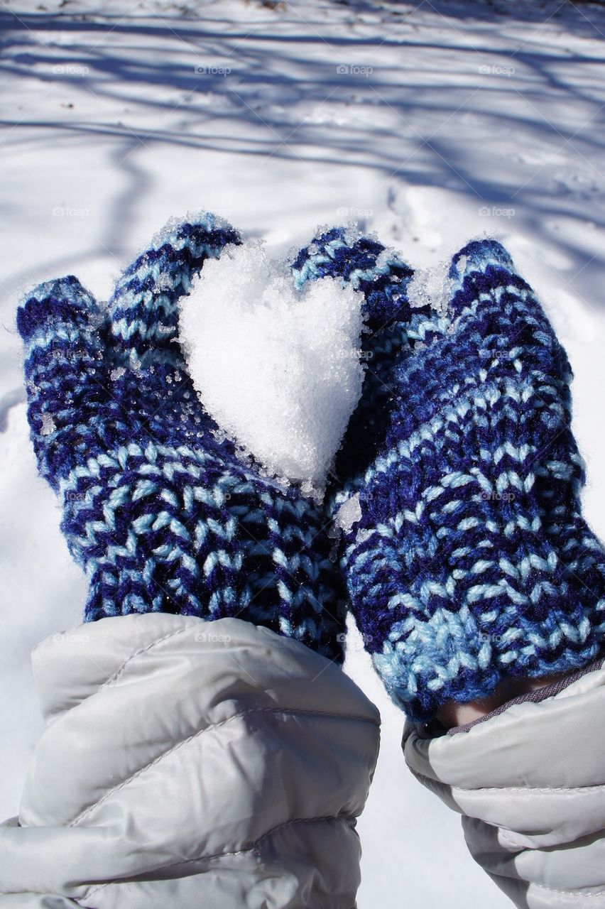 Snow on human hand