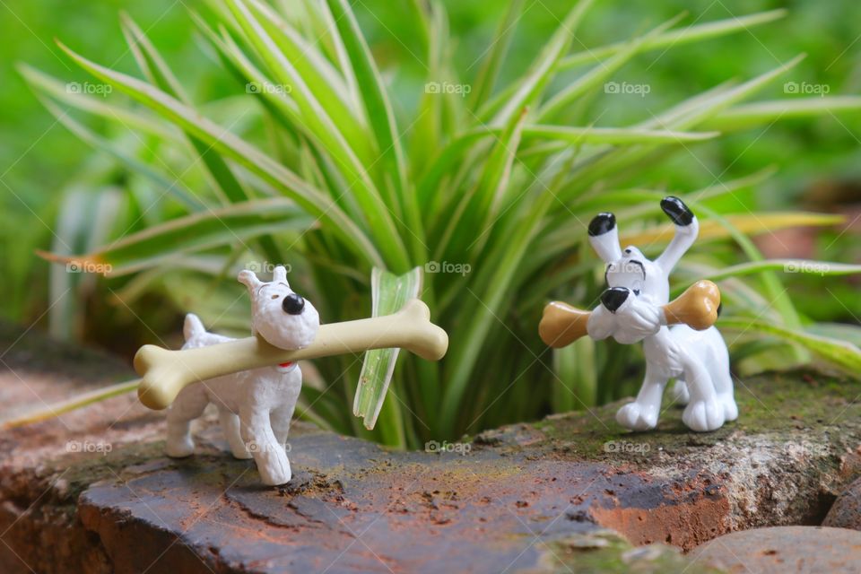 Toy figurine of Snowy and Idefix