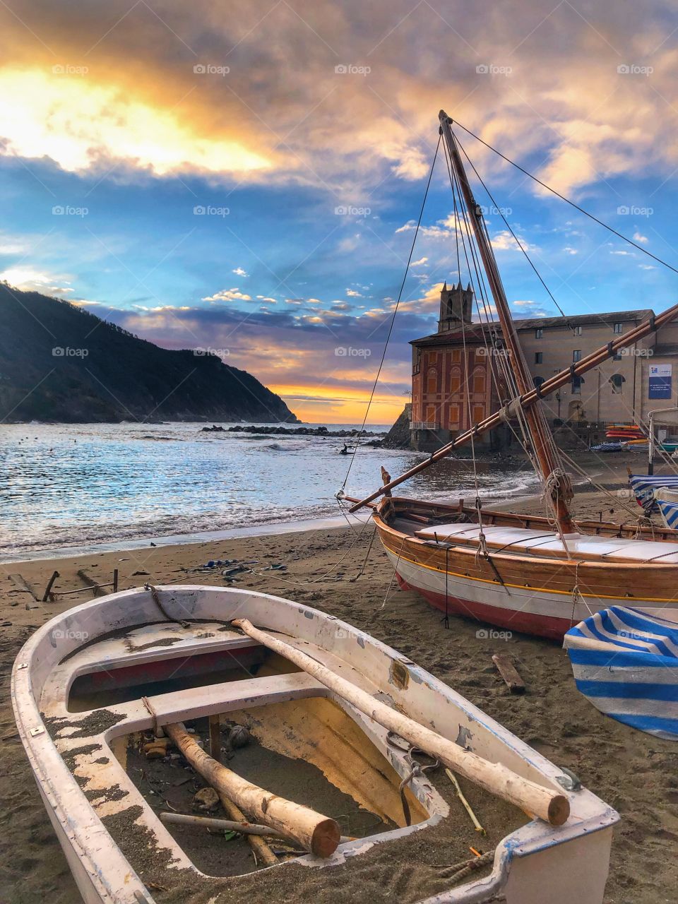 Baia del Silenzio, sea sun sand and boats landscape