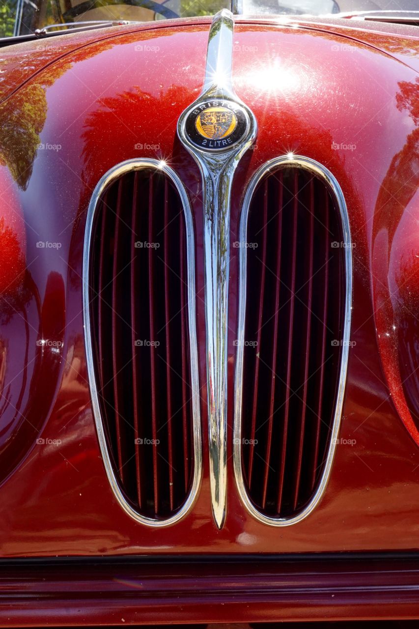 Bristol classic car. Bristol classic car grill in chrome and red wiyh badge