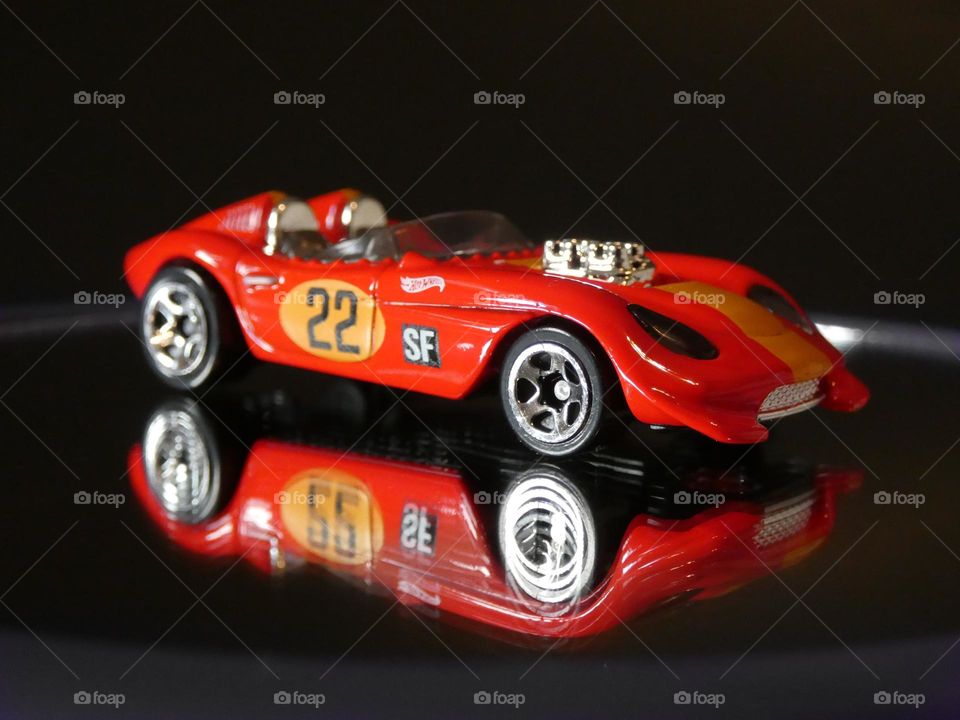 Red Hot Wheelz car with mirrored reflection