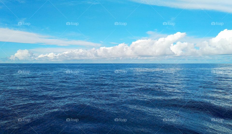 Cloudscape on the sea, the beauty of the cumulonimbus cloud formation.