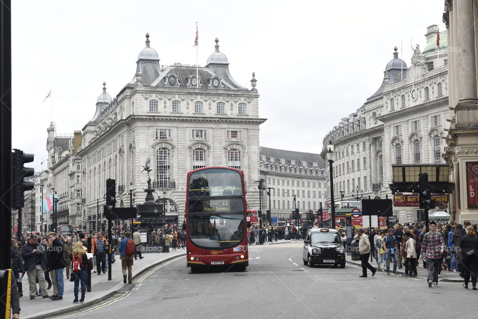 Busy street view Piccadilly Circus in London.