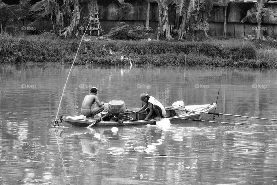 Fishing in the river - black and white mood