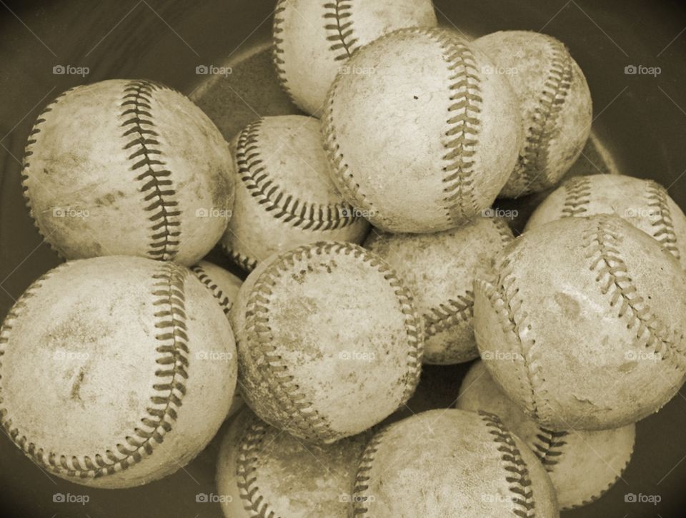 Baseballs. Bucket of baseballs