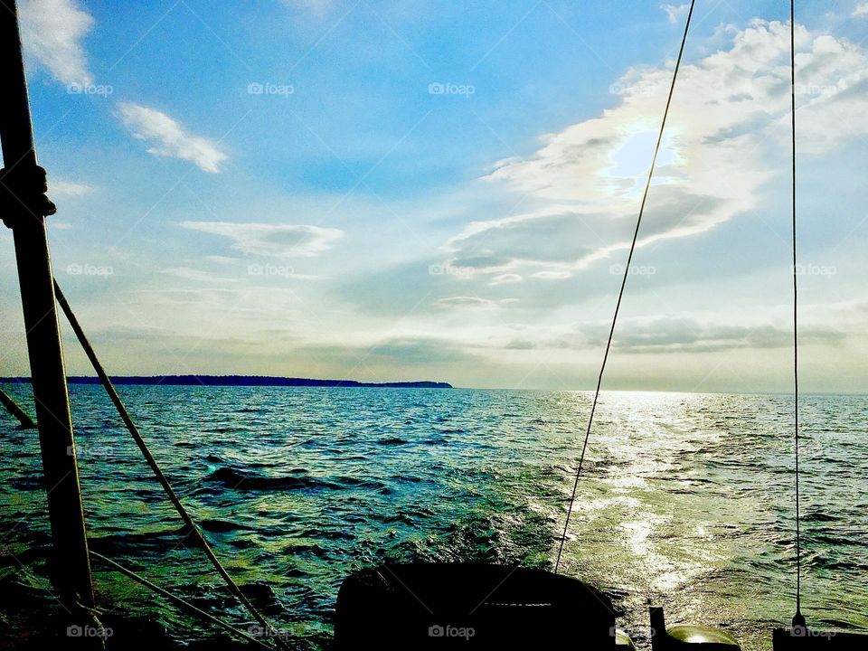 A particularly colorful inspiring sunset during the “golden hour” when the sun’s setting rays bathe everything it touches in a warm golden glow. 2019. Hypnotic Productions