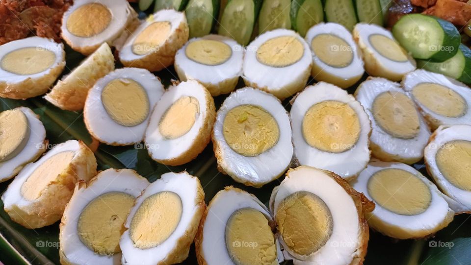 halved boiled egg dish in the party