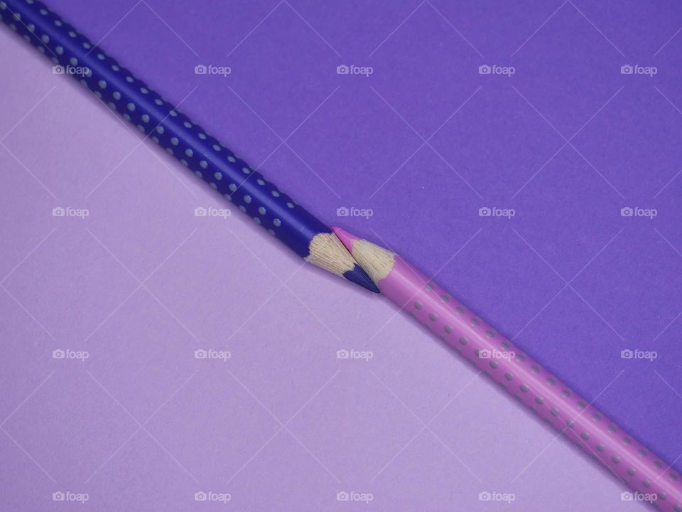 Two purple pencils