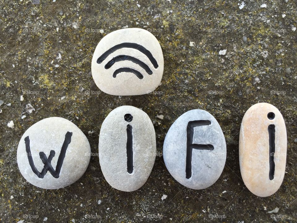 Symbol of wi fi on stones