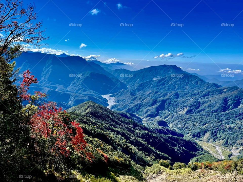 Beautiful mountain scenery with blue sky white colour clouds
