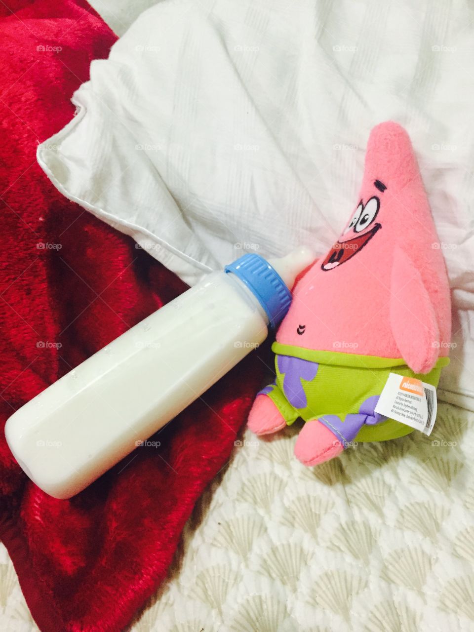 Patrick having fun. Drinking my baby formula