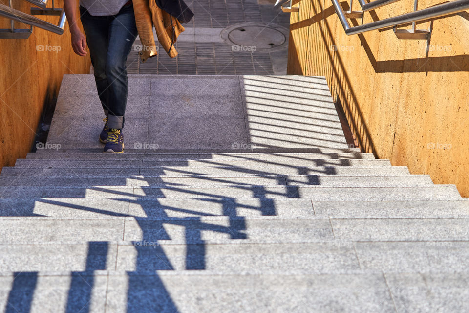 Low section of person on staircase