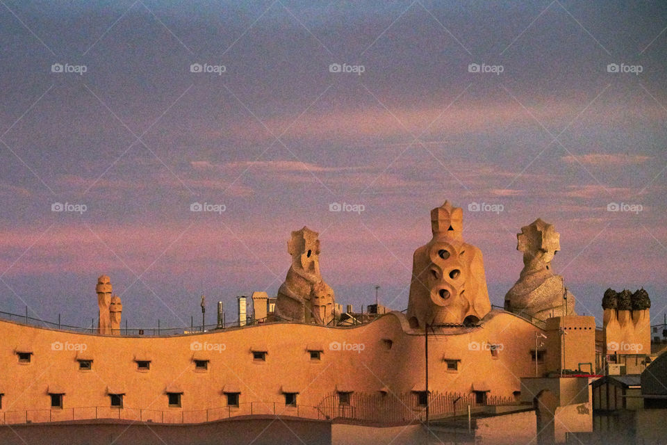 Noisy sunset over La Pedrera