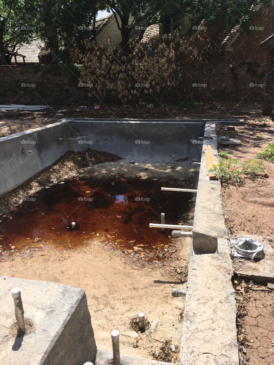 Texas tea, a common joke about the filthy water we swim in. This is a picture of a swimming pool in the making 