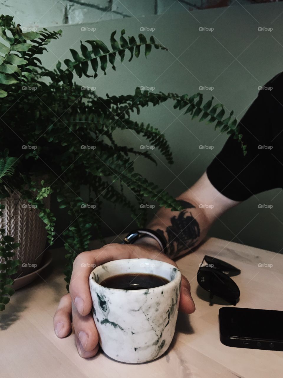 Plants, coffee, hands
