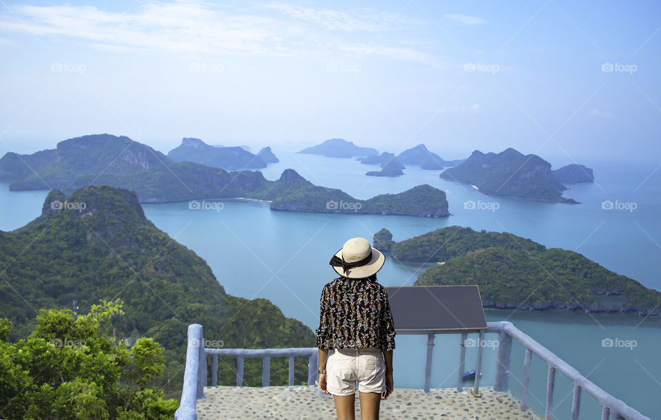 woman on Pha Jun Jaras Viewpoint at Angthong Islands , Suratthani in Thailand