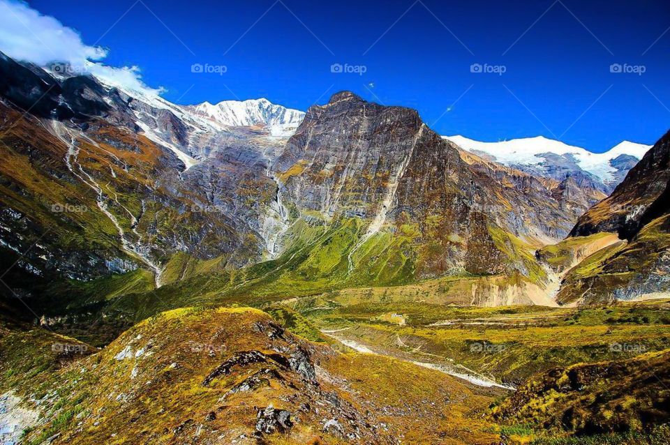 A panoramic view taken during our day hike above Italian Base Camp.We had the entire valley and mountain range to ourselves. Photo taken on the Dhaulagiri Circuit Trek in Nepal.
