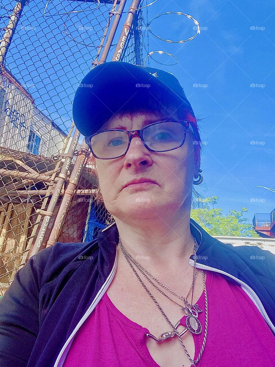 This is a photo of me, „Petra Schiller“ a.k.a. „Maxine Firefox“ or „Maximiliane Feuerfuchs“ in the parking lot under the „Pulaski Bridge“ at „Newtown Creek“ in LIC, Queens on a beautiful Indian summer day in early October 2023. Hypnotic Productions