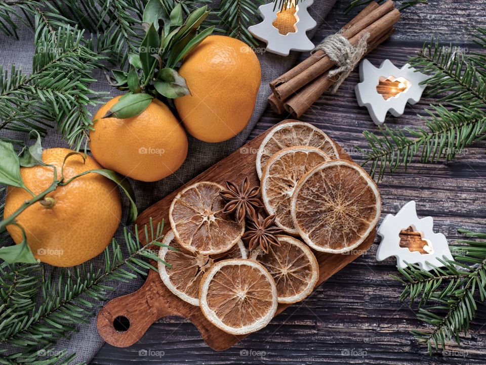 Christmas still life with dried orange and mandarins