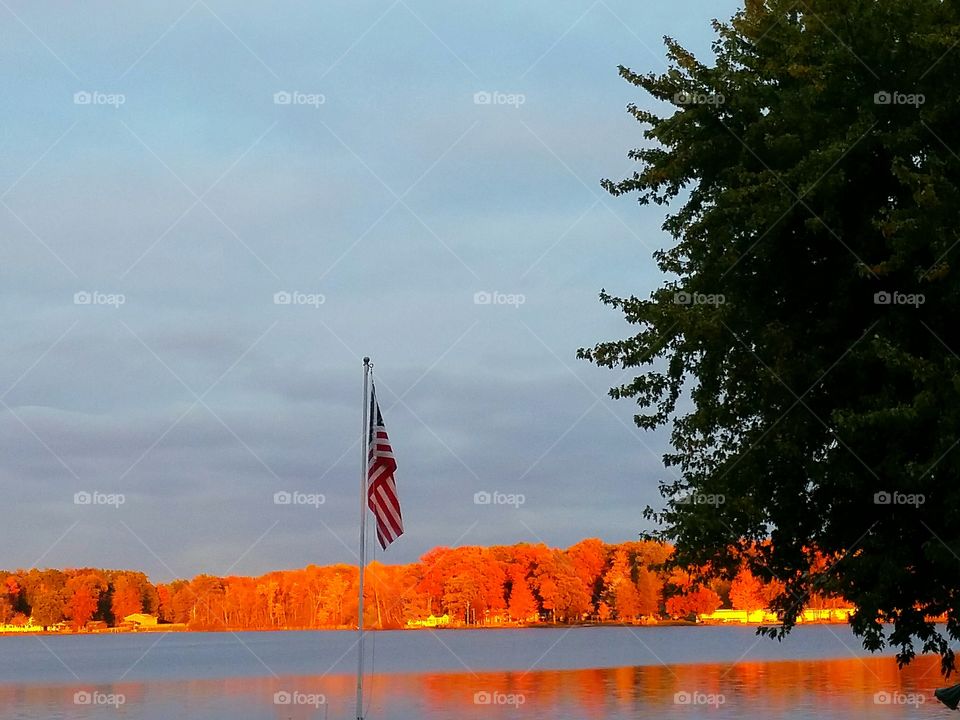 US Flag with Background of Fall Colors