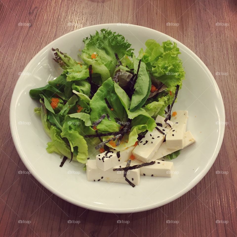 Tofu salad on table