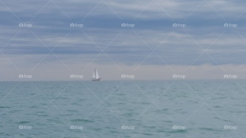 lone sailboat