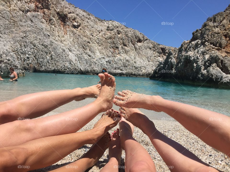 Four pairs of womans legs