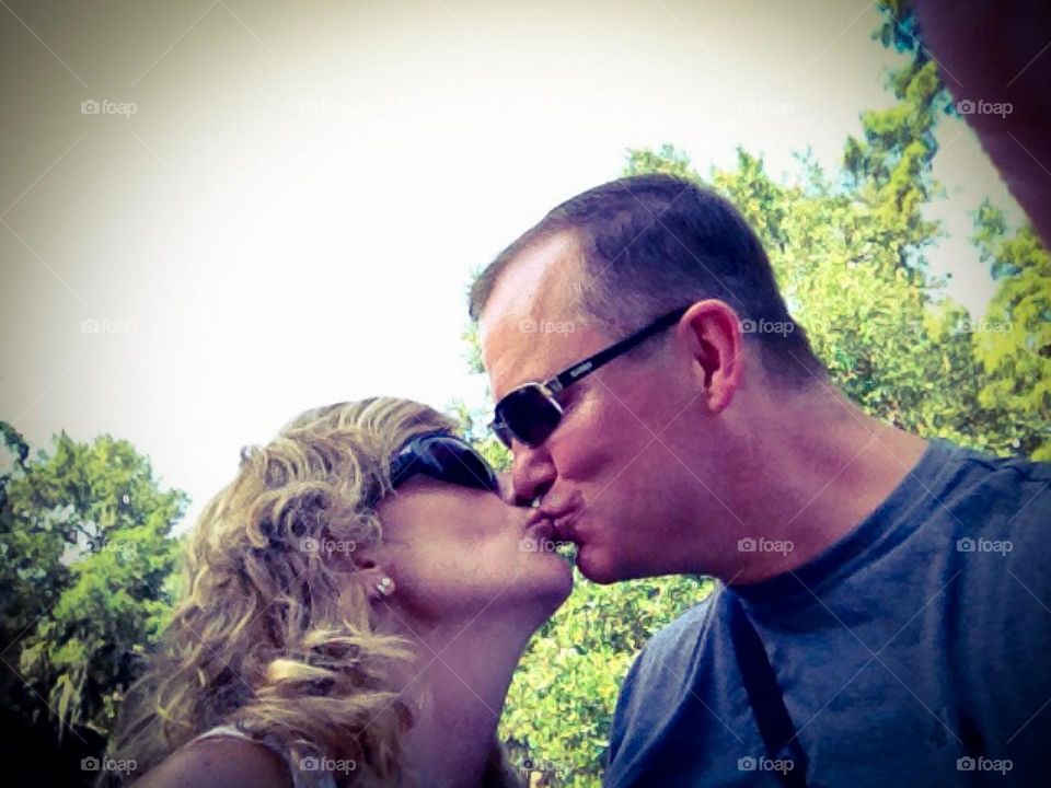 Selfie kiss in the park.