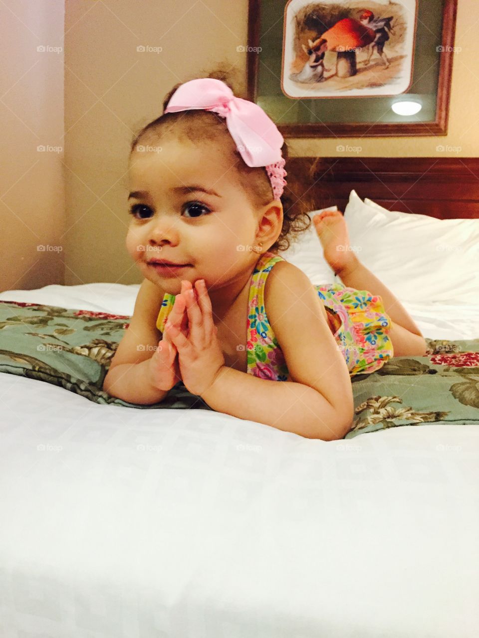 I'm ready for my Close-up!. Cute baby in a swimsuit, about to head out to the waterpark