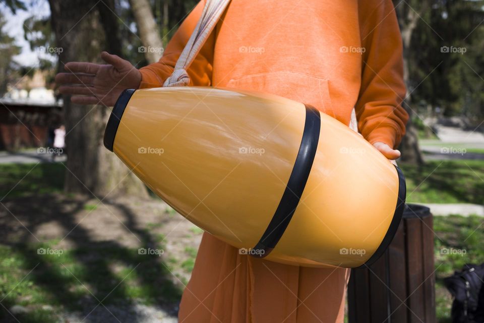 Hare Krishna Mrdanga Drum . close up view . Hare Krishna Man Playing Traditional Indian Instrument Mridanga