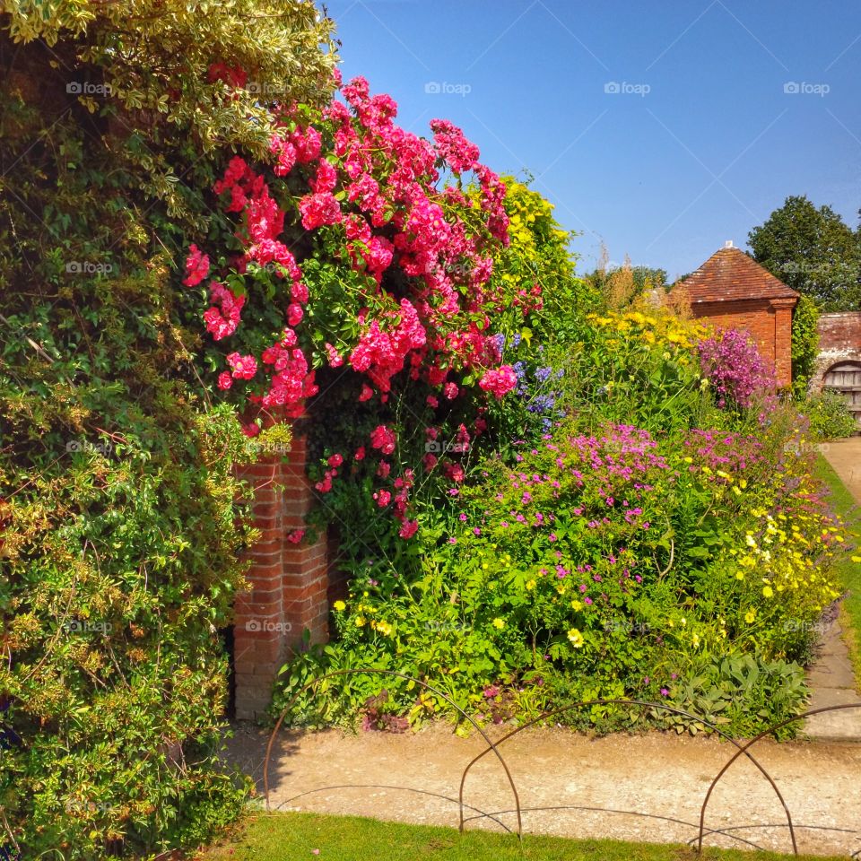 	Formal gardens of Packwood House stately home - Warwickshire, England UK.