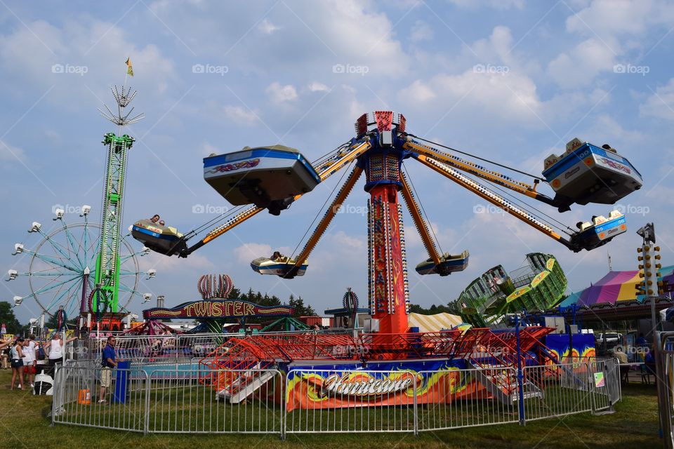 County Fair. People enjoying rides at the County Fair.