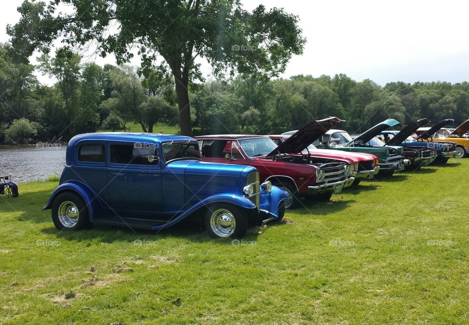 cars. car show in summer by the river