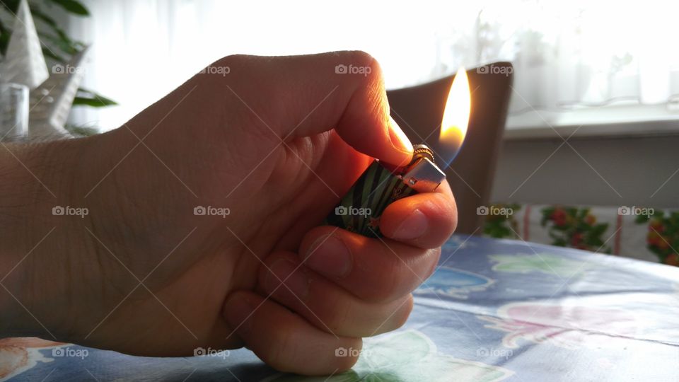 lighter in a hand