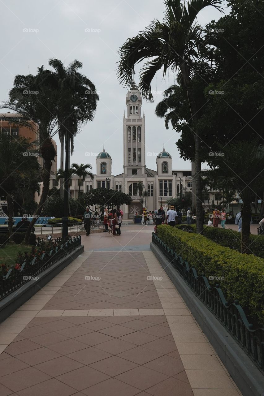 Central park of the city of Machala in Ecuador with church