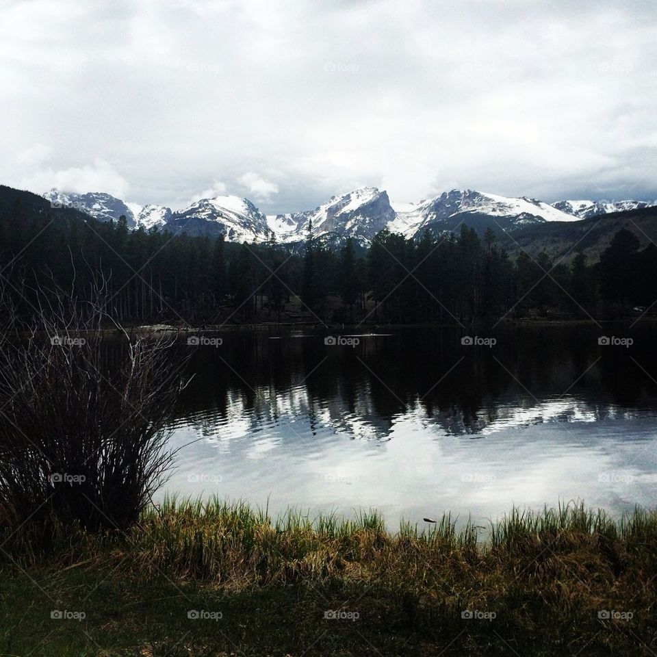 Snowy mountain reflected on Sprague lake