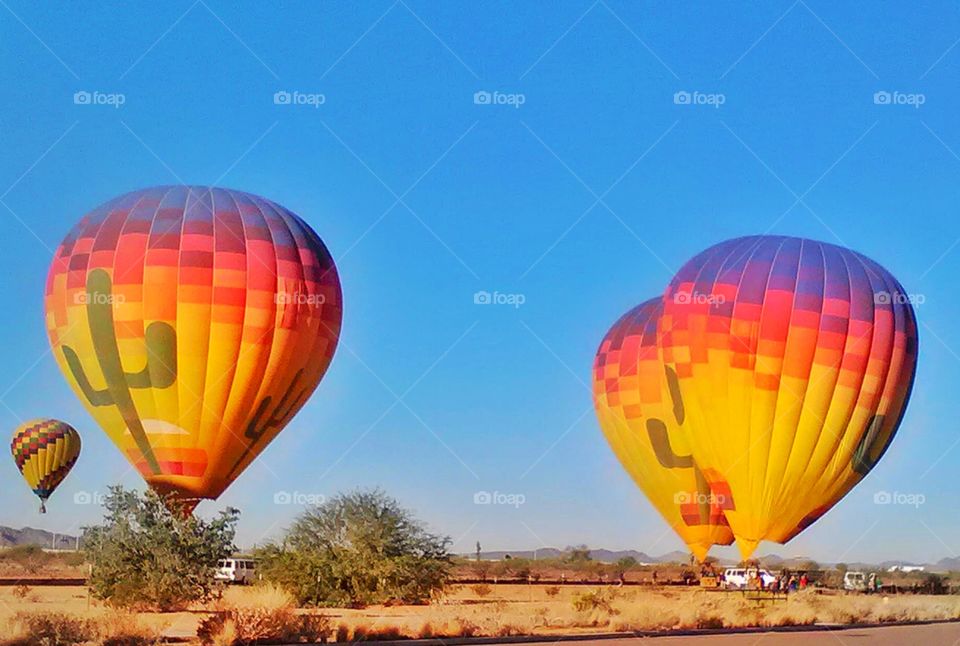 Hot air ballon front of my kids school, what a beautiful view.