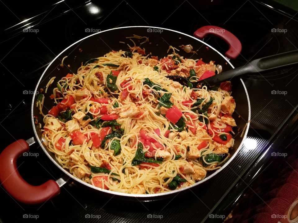 Chicken, spinach, and tomato pasta
